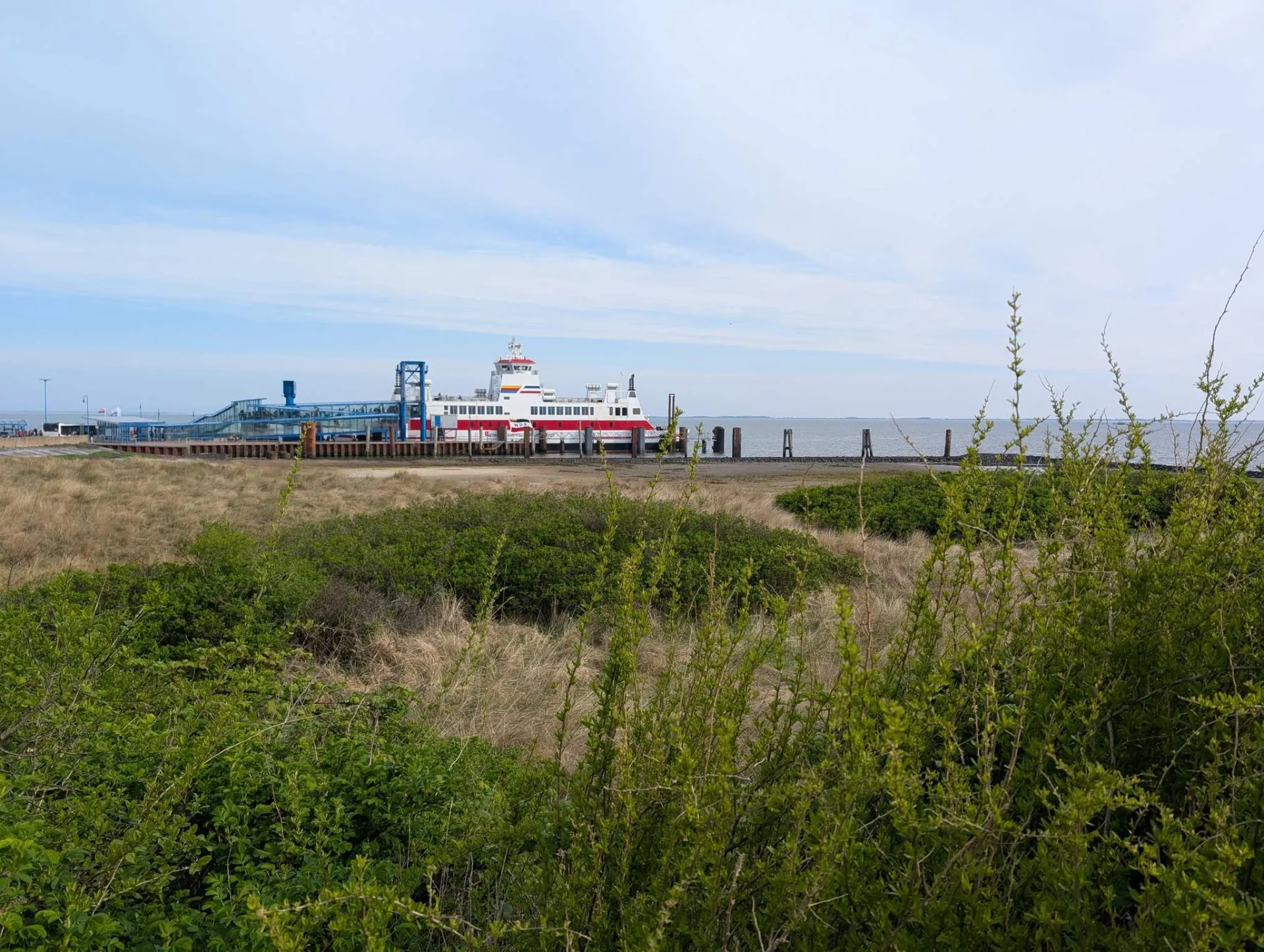 Off to Amrum by ferry — the red-and-white boat waits at the pier.