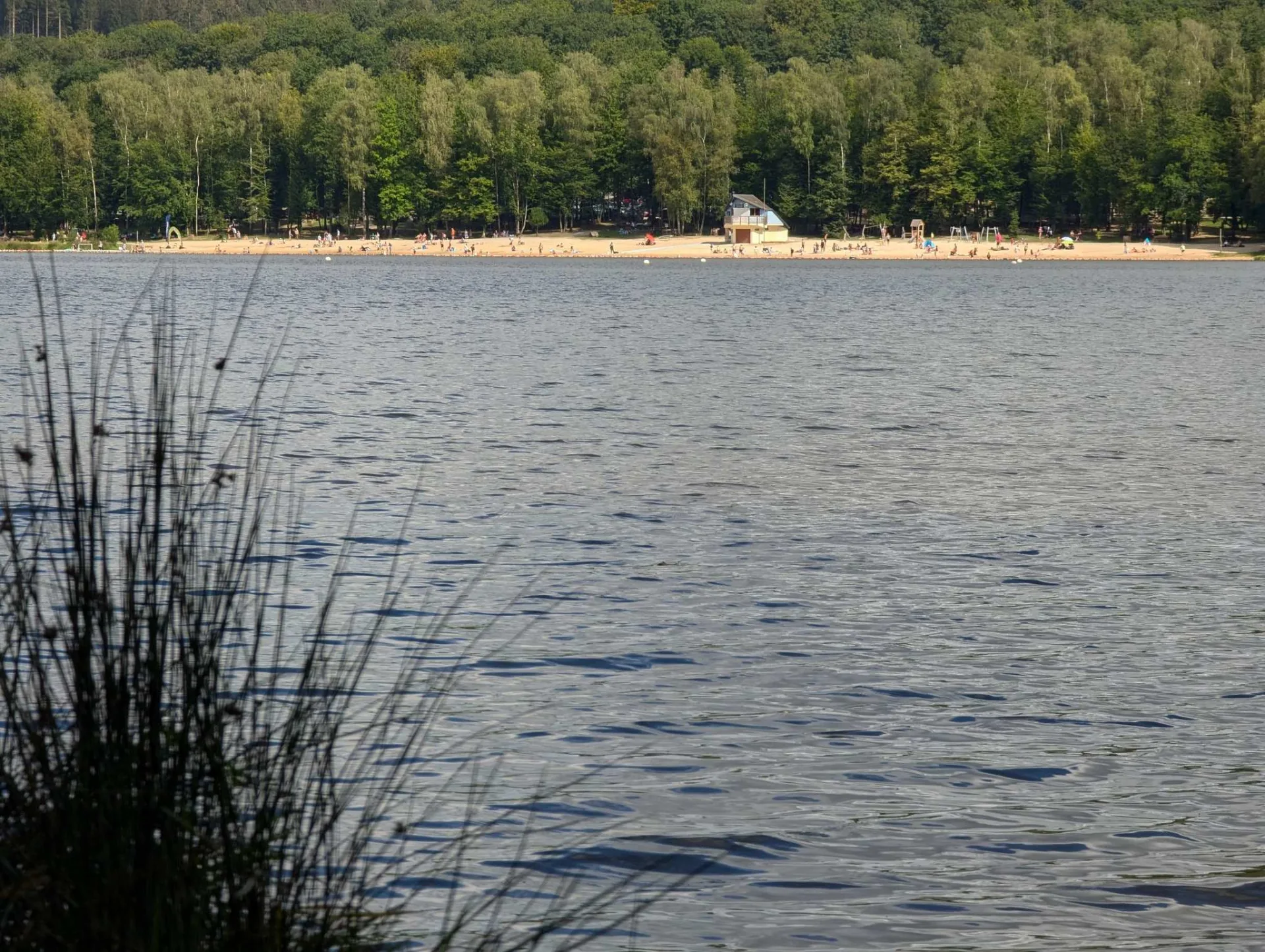 The lido on the far shore — where the family spent their days sunbathing.