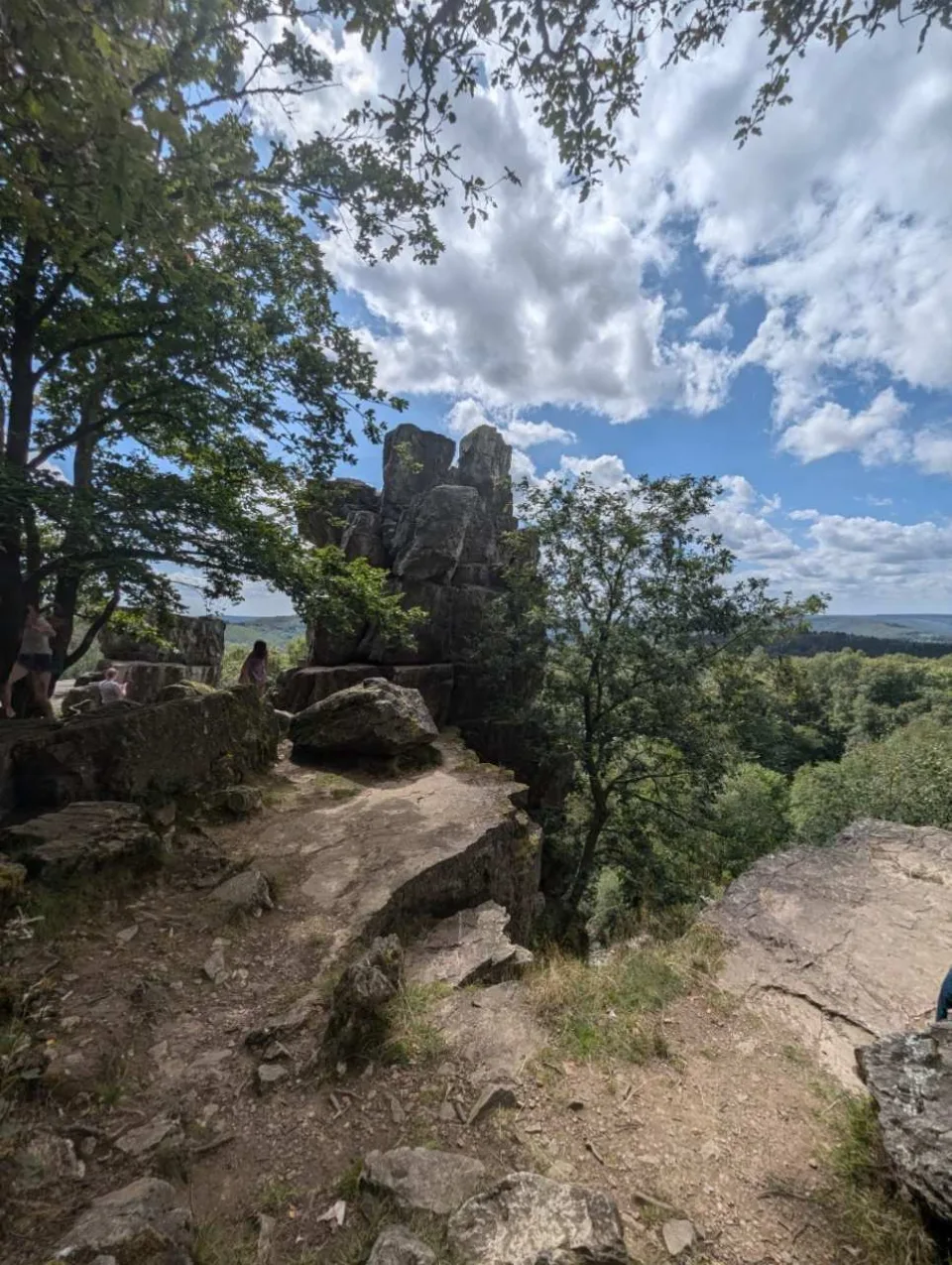 The jagged pinnacles of the Roc la Tour above the wooded valley — a rewarding place to rest.