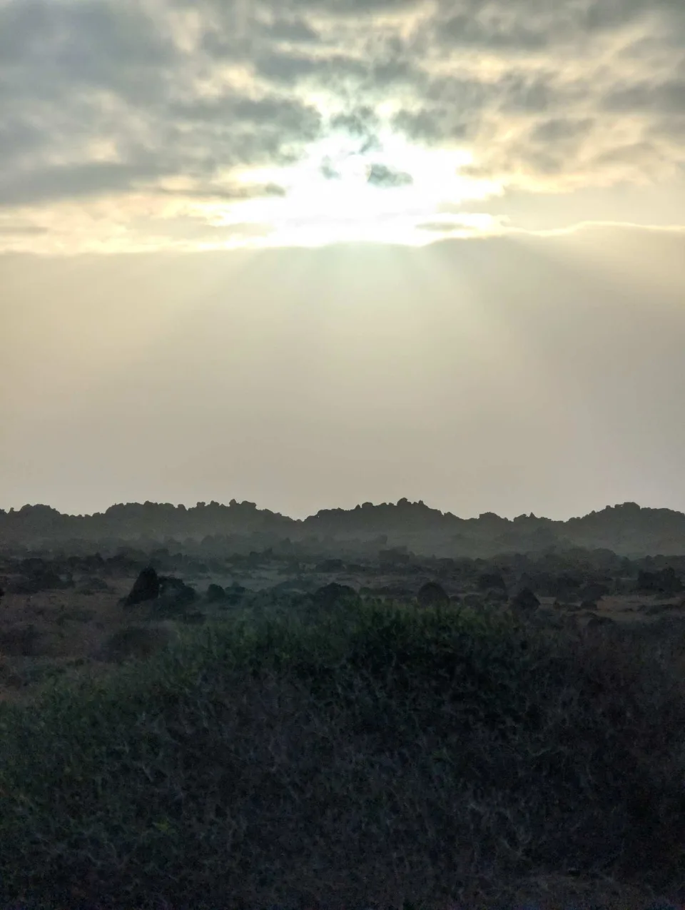 The sun drops behind the hills — evening on the Costa del Rubicón.
