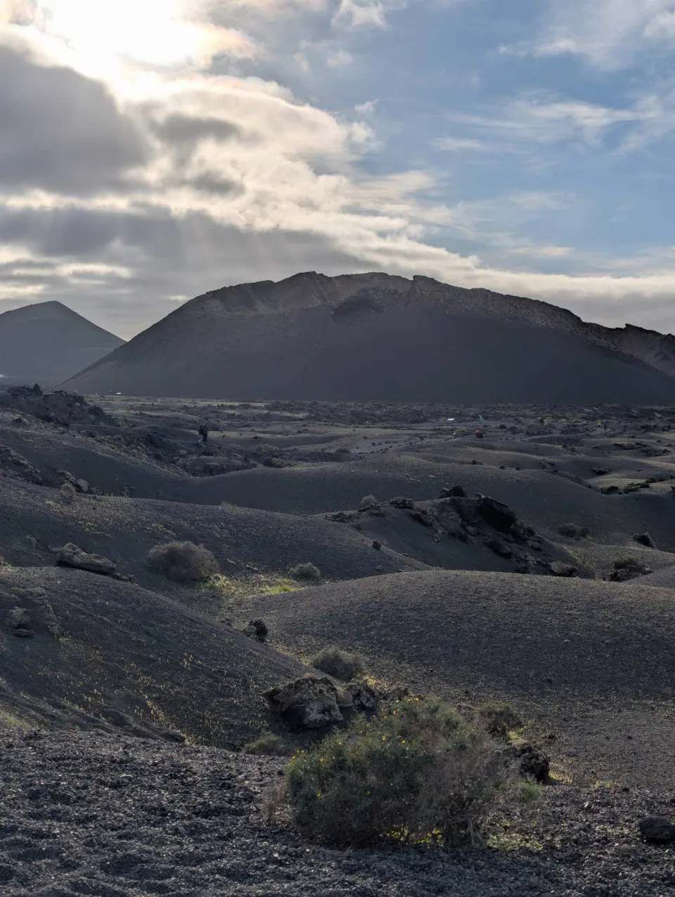 The crater's dark slopes from another side.