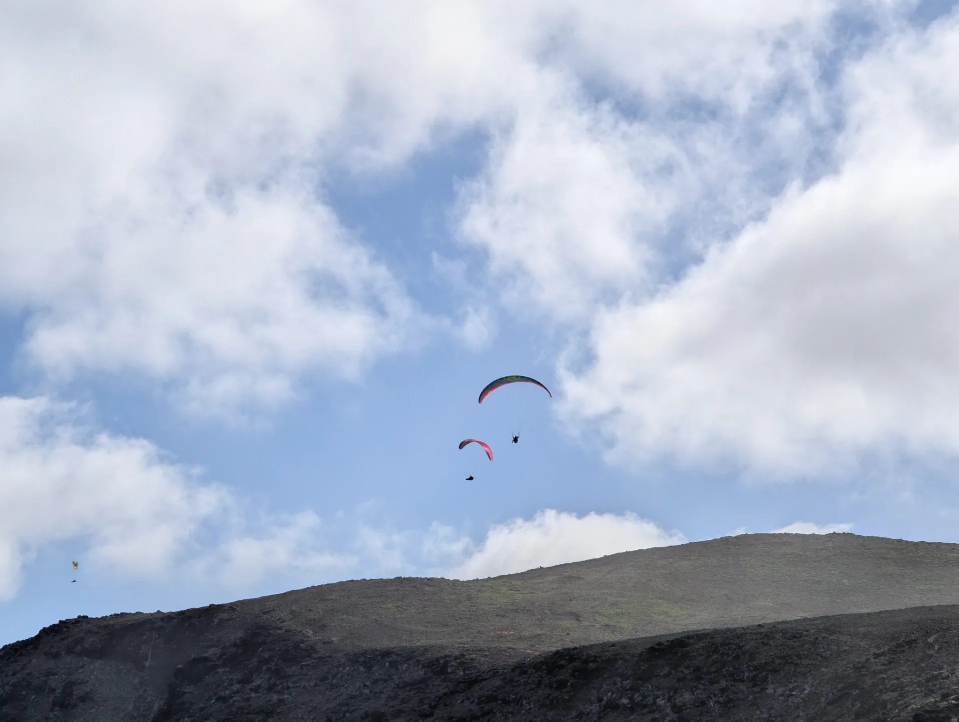 Another paraglider — the area is popular with pilots.