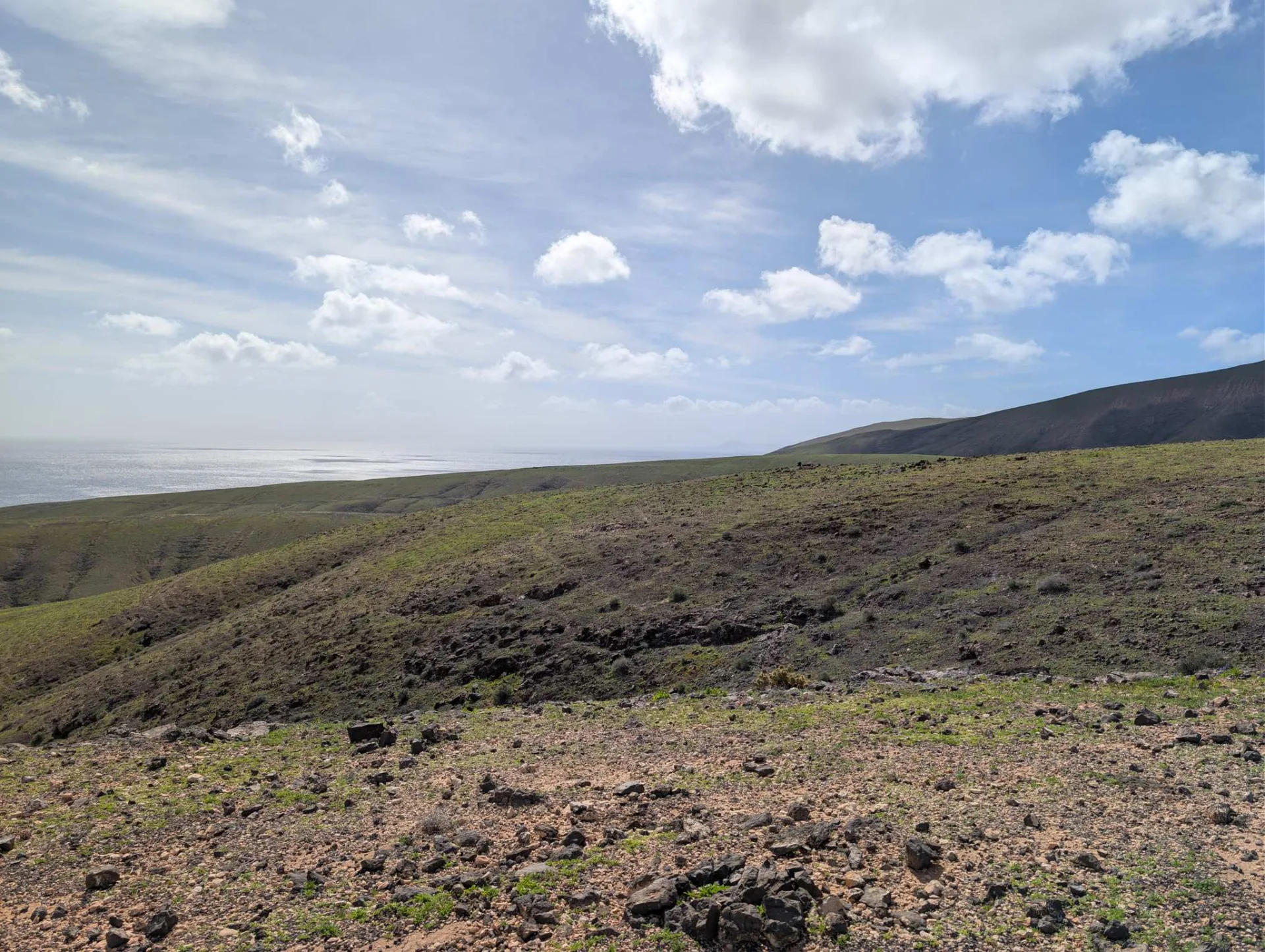 The wide green hills of the Los Ajaches park.