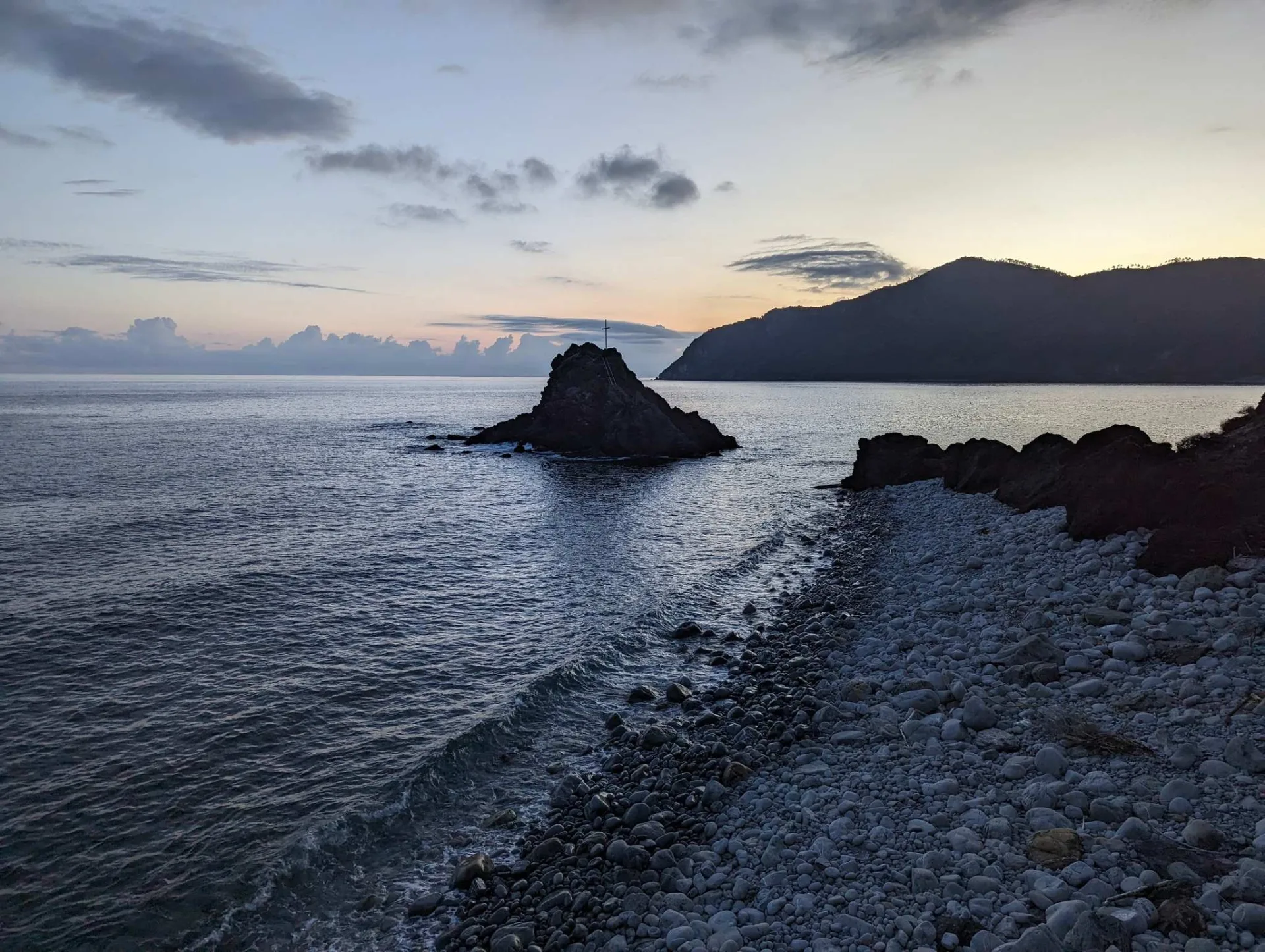 The same rock at dusk