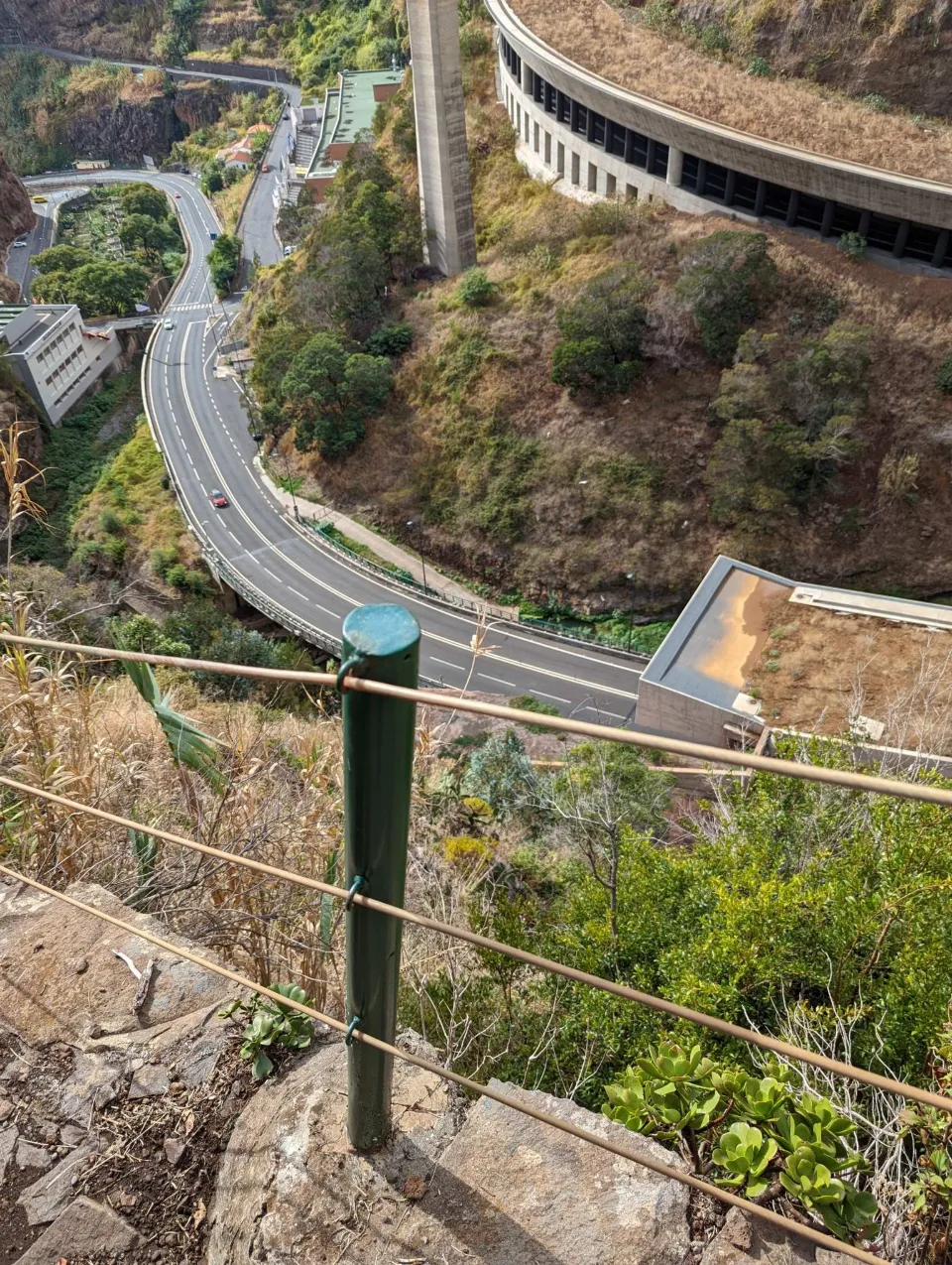 A steep look down onto a winding road above Funchal
