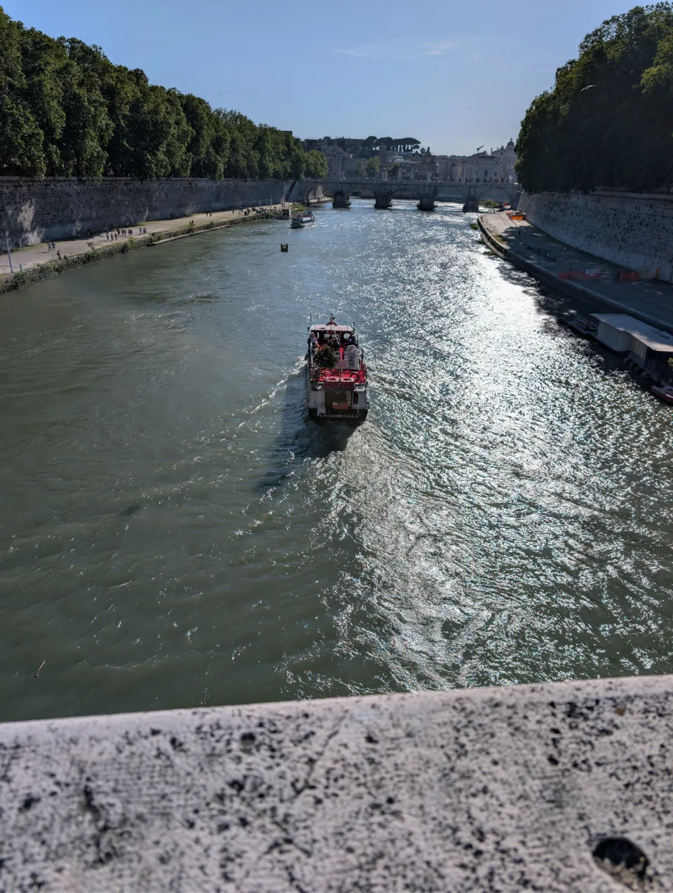 A boat on the Tiber in midday light