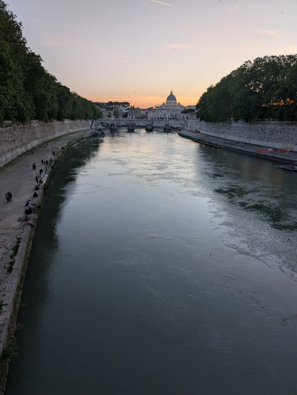 Tiber in the evening light — St. Peter's dome behind
