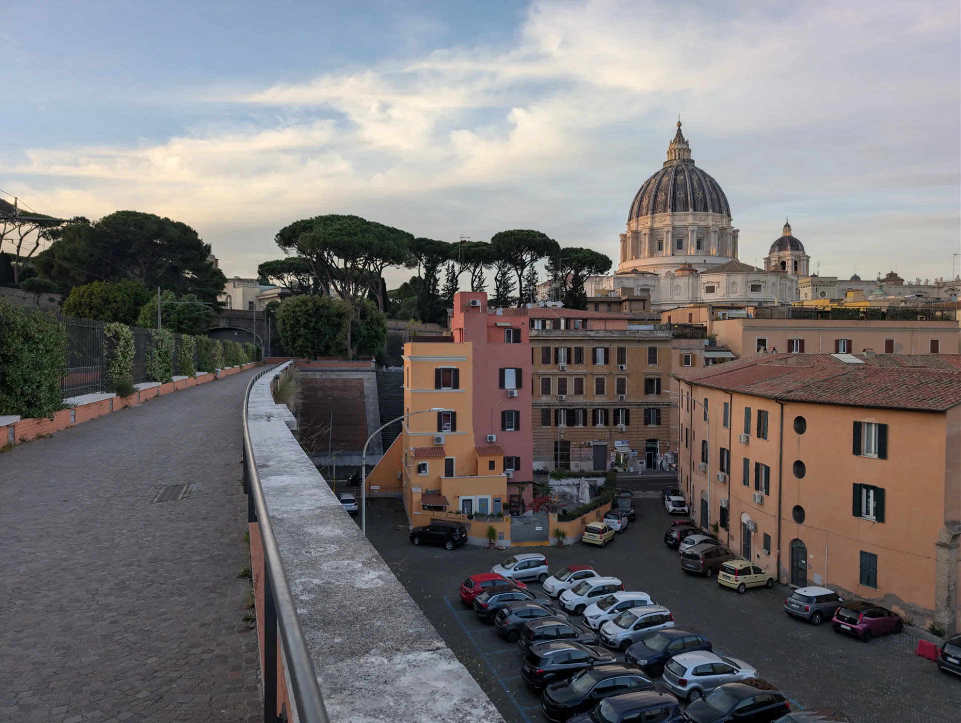 Glimpse of the Vatican City through a gap between buildings