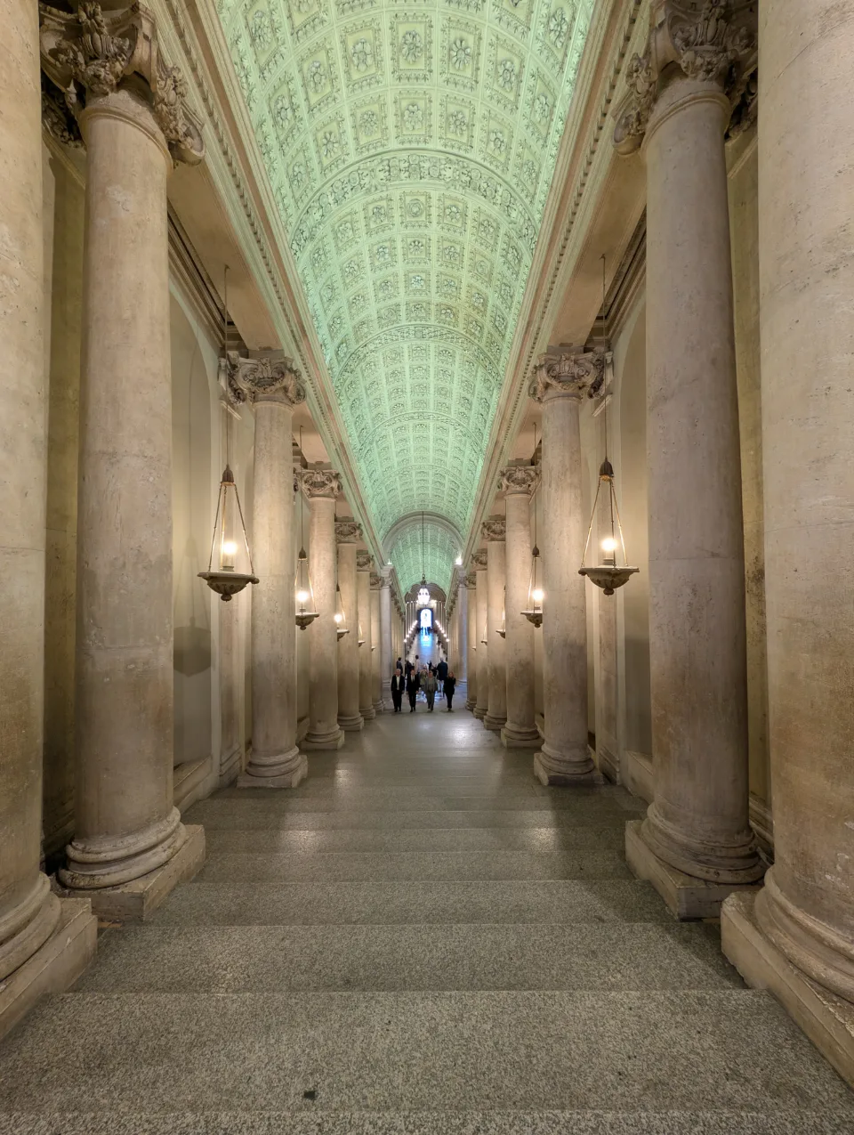 Vaulted ascent to the Vatican Museums — early morning, before the crowds